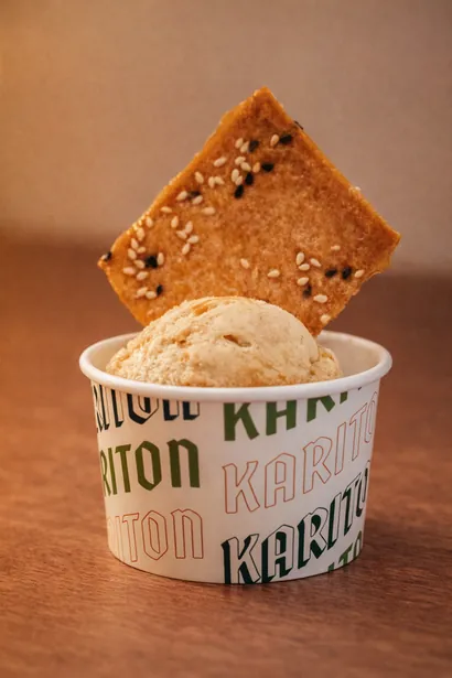 Turon gelato in a Kariton cup, topped with a sesame crisp